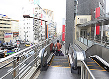 Go down to the ground level by the escalator and then head straight to Keio-hachioji Station.