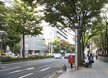 With the No. 12 Entrance/Exit to your back, move forward. You will see the Nagoya Naka City Hall to your right.